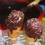 Chocolate covered cone with sprinkles